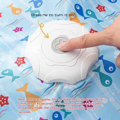 Paw button on the motor unit, press it to start the teaser wand