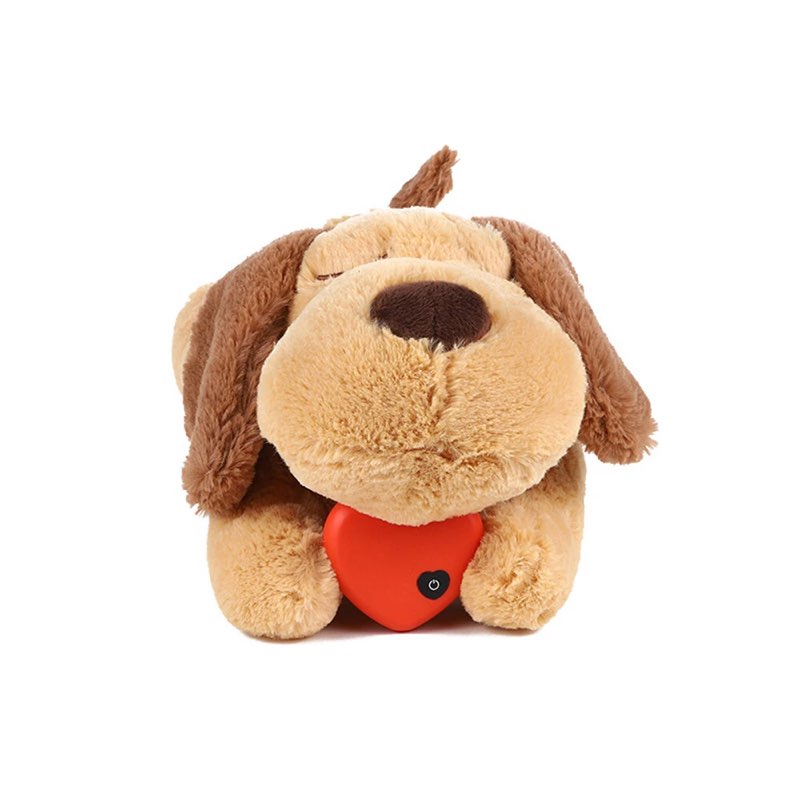 Front view of the Calming Frenchie Heartbeat Toy plush holding the red heartbeat module