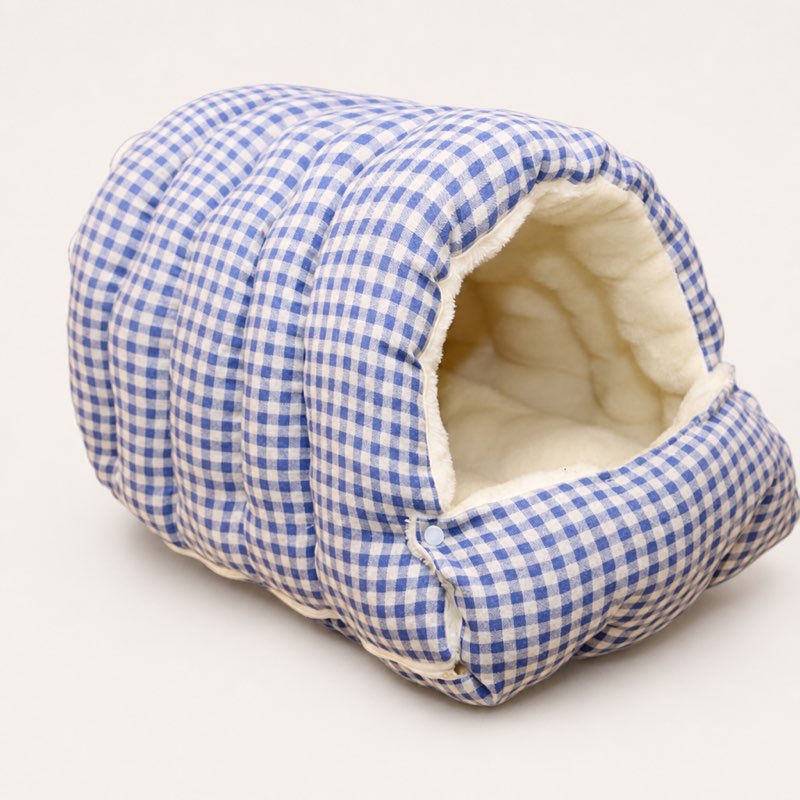 Blue plaid Frenchie cave bed with cream sherpa lining