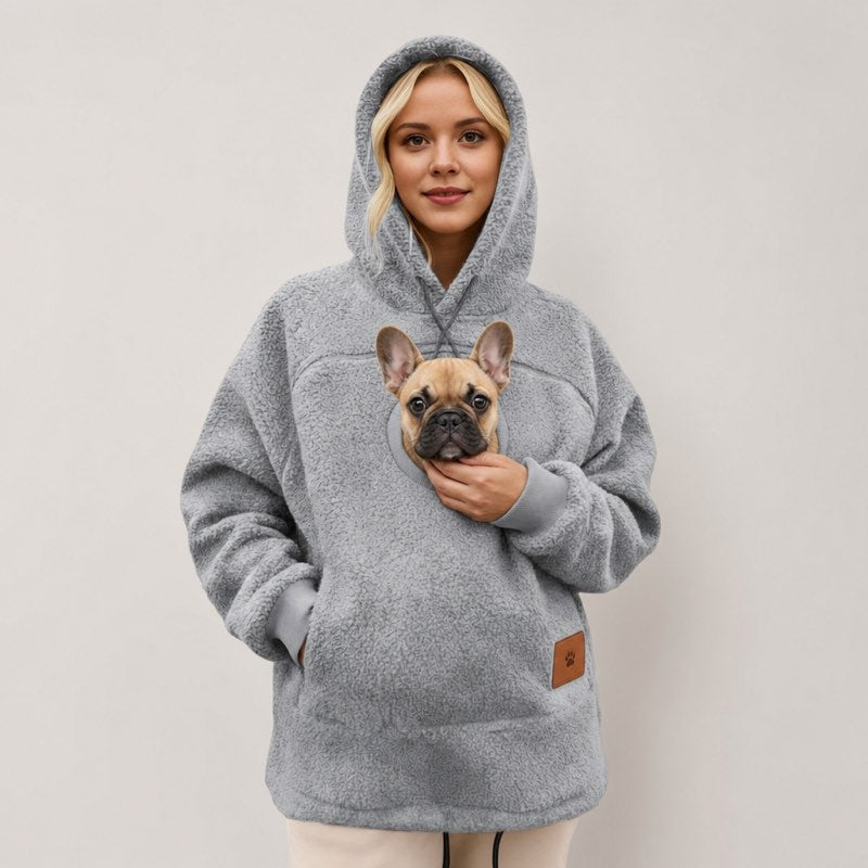 Woman in a gray Sherpa French Bulldog Carrier Hoodie with a fawn French bulldog in the front pouch