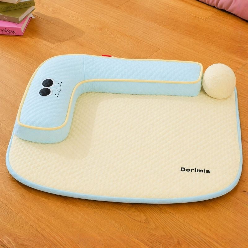 Blue Summer Frenchie Cooling Bed top view with raised headrest and ball pillow