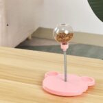 french bulldog feeding stick